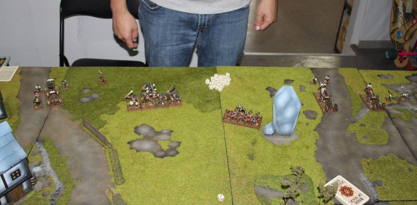 Dogs of War were started at the north - near the Remine town - Dragonlord was hidden behind the buildings, but next from the left: Galloper gun led by , Wizard Generla Andrela de Remine, Ogres, Slayers, and two Galloper Guns on the right.