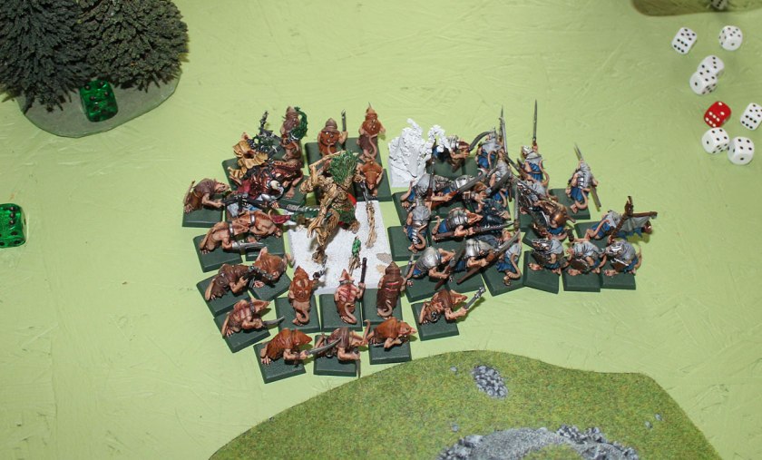 Treemen and Elven Lord surrounded.